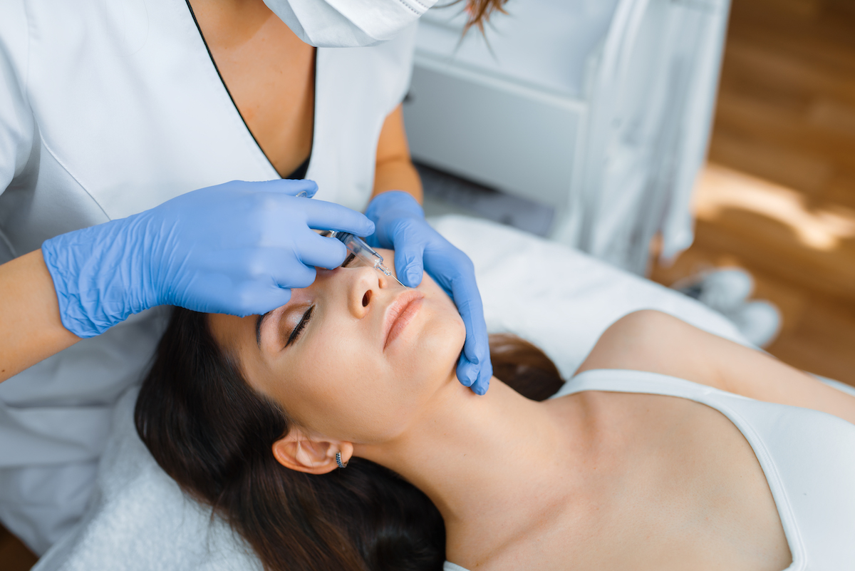 A woman receives botox injections after a non-surgical facelift in Houston